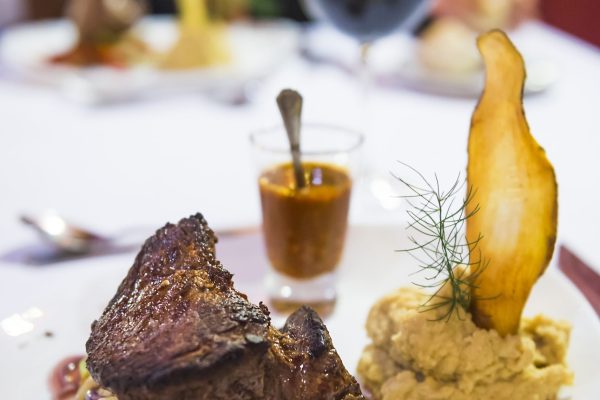 Delicious Argentinian Steak Dinner at a fine dining restaurant with a glass of red wine, North Argen